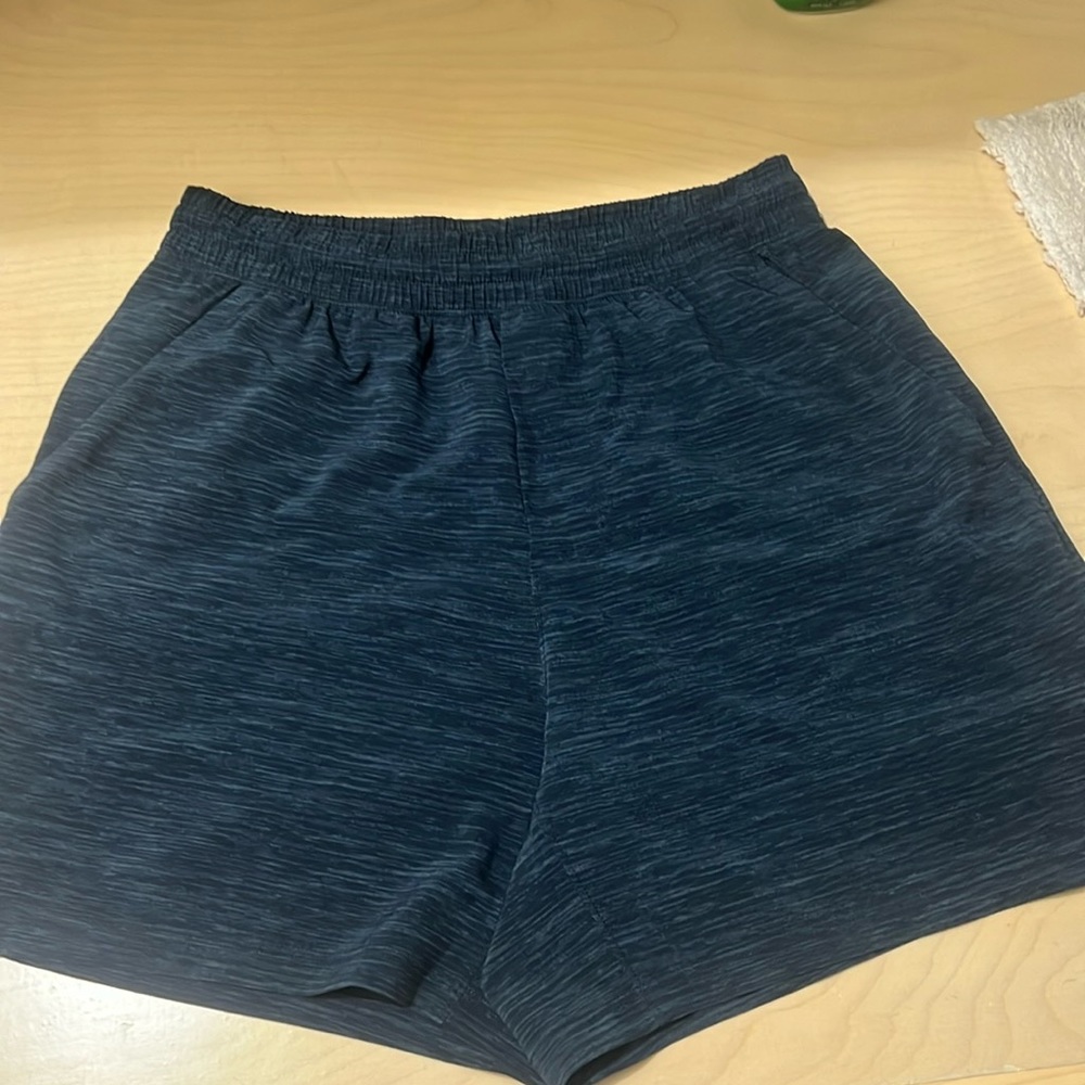 Men’s linerless lululemon athletic shorts. 7” inseam. Size small. Never worn.
